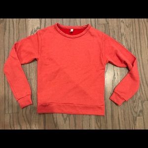 Red-orange long sleeve shirt